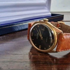 Cyma navystar chronometric gents  automatic date gold plated watch 21 jewels