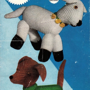 May include: A vintage knitting pattern for a white lamb and a brown dachshund. The pattern is from Weldons Knitwear and is for double knitting. The pattern includes the amount of yarn needed for each animal.