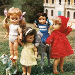 May include: A Patons 1371 pattern booklet for doll's clothes in 4 sizes to fit a 10, 12, 14, or 16 inch doll. The cover features four dolls wearing knitted outfits: a white set, a yellow dress, a blue striped top, and a red hooded coat.