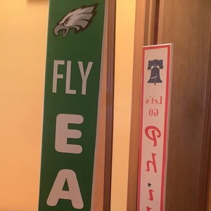 Dwustronny znak na werandzie Eagles / Phillies