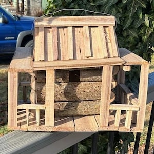Rustic log cabin birdhouse