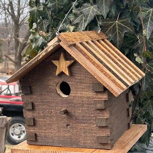 Handmade log cabin birdhouse