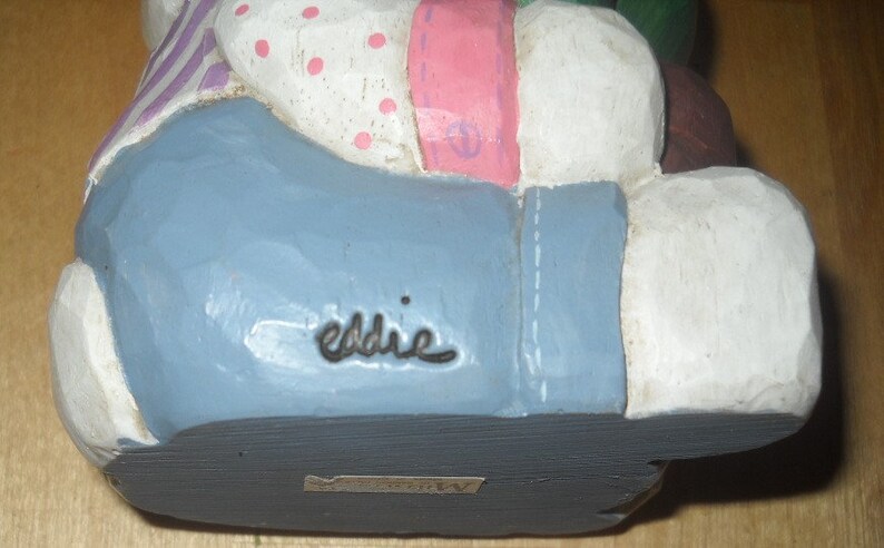 Eddie Walker Easter white rabbit bunny holding flower pot purple tulip blue pants 3 by 6