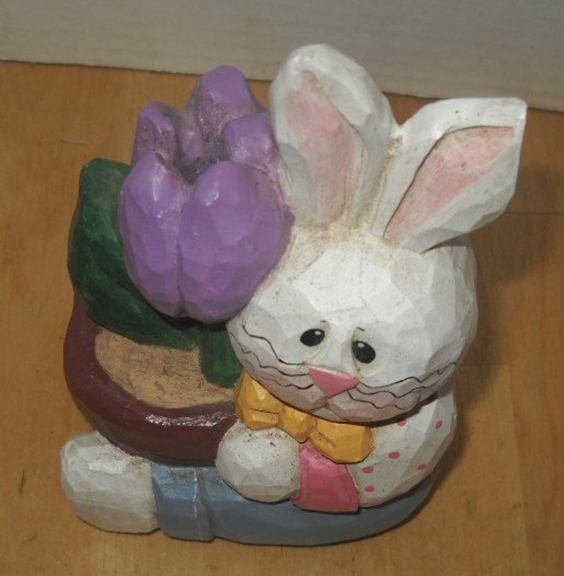 Eddie Walker Easter white rabbit bunny holding flower pot purple tulip blue pants 3 by 6
