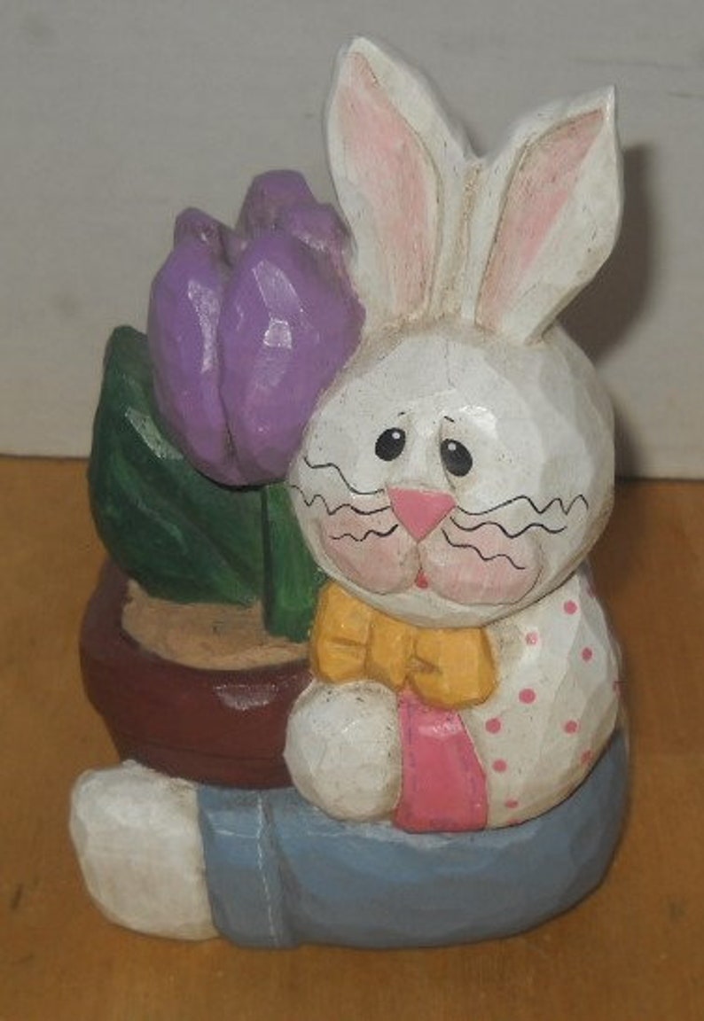 Eddie Walker Easter white rabbit bunny holding flower pot purple tulip blue pants 3 by 6