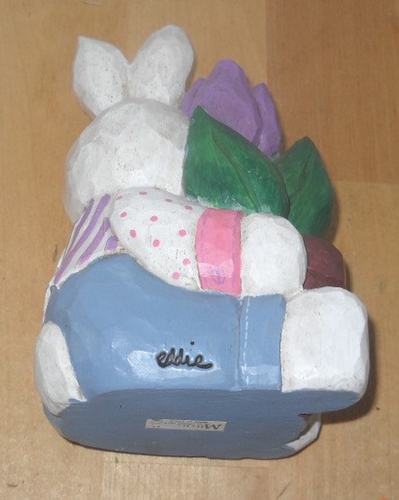 Eddie Walker Easter white rabbit bunny holding flower pot purple tulip blue pants 3 by 6