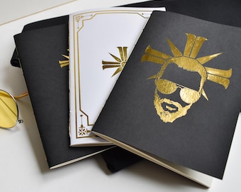 Eden's Gate themed gold foil notebook