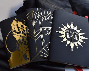 Clair-Obscur Expedition 33 gold foil notebook