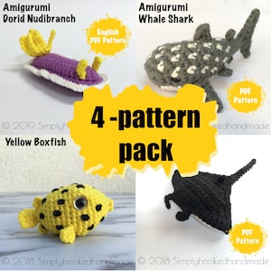 May include: Four crocheted amigurumi sea creatures are shown: a purple Dorid Nudibranch, a grey and white Whale Shark, a yellow Boxfish, and a black manta ray. The image includes the text "4-pattern pack" and "English PDF Pattern".