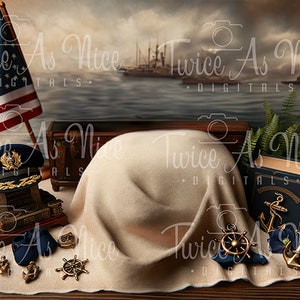 May include: A nautical themed newborn photography prop set with a white blanket, a blue and gold pilot's hat, a book with an anchor design, a wooden ship's wheel, and a small anchor.