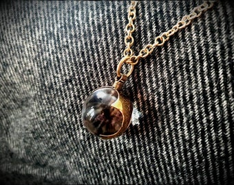 Lente vikinga Visby Gotland Esfera de cristal con cadena