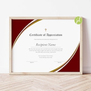 May include: A framed certificate of appreciation with a wooden frame. The certificate has a white background with a burgundy and gold design. The text reads "Certificate of Appreciation" and includes a space for the recipient's name.