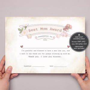 May include: Printable Best Mom Award certificate with pink floral design. The certificate has a space for a signature and date. The text reads "Best Mom Award" and "Presented To".
