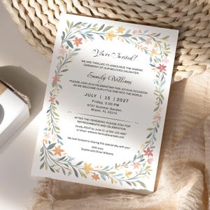 May include: A white rectangular invitation card featuring a floral border with green leaves and small flowers in shades of yellow, orange, and pink. The text announces a naming ceremony for Emmily Williams on July 15, 2027, at 3:00 PM in Miami, FL.