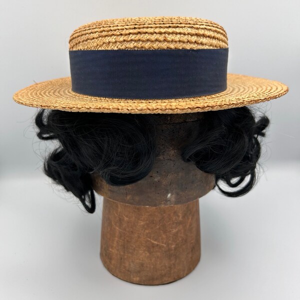 Vintage straw hat boater with dark blue band 54cm 21” circumference possibly a school boater