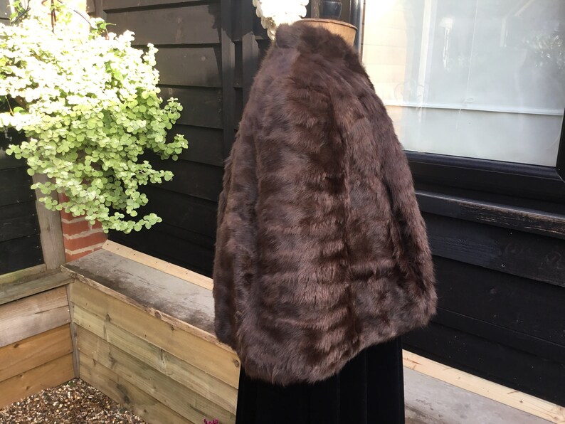 Vintage fur cape with arm slits 1950s from Brahams Norwich horizontal seaming