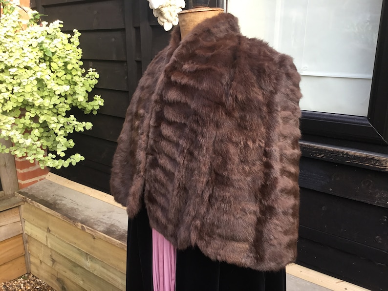 Vintage fur cape with arm slits 1950s from Brahams Norwich horizontal seaming