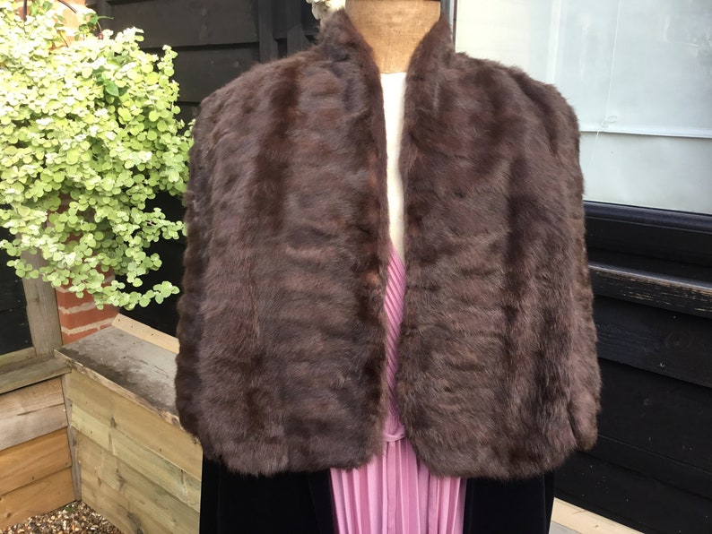 Vintage fur cape with arm slits 1950s from Brahams Norwich horizontal seaming