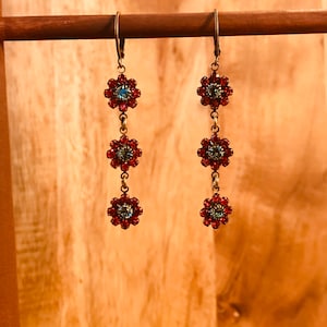 Light Siam and Ernite Swarovski Flower Dangle Earrings.