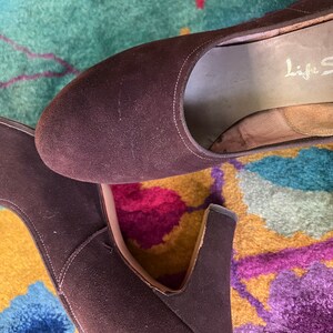 scuff on the right and fabric flaw on the left instep --