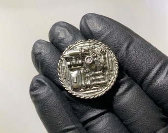 Single Coin #3, handmade sand-cast pewter coin pocket sculptures in scifi, steampunk, archaic style