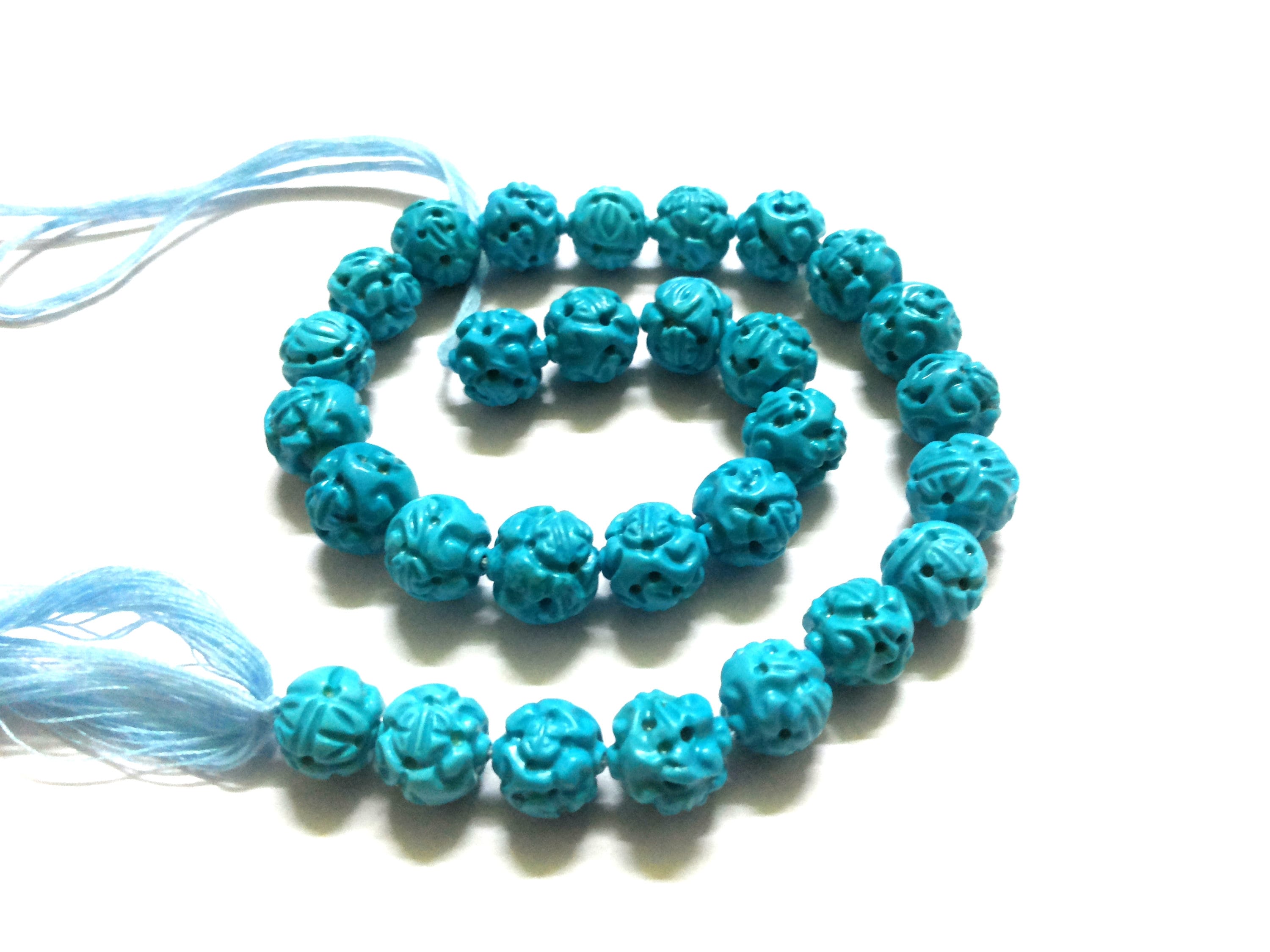 Carved turquoise beads deals
