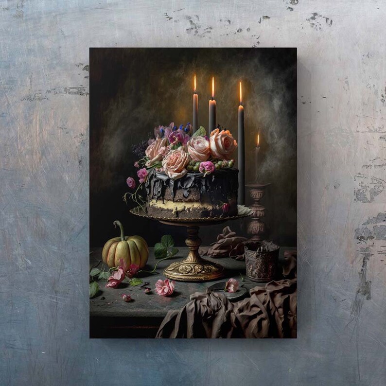 May include: A dark chocolate cake decorated with pink and purple flowers, topped with a black chocolate ganache, and surrounded by lit candles. The cake is on a gold stand and a small pumpkin sits on the table next to it.