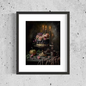 May include: A dark chocolate cake decorated with pink and purple flowers, lit by three candles, on a gold cake stand with a pumpkin and a brown cloth in the background.
