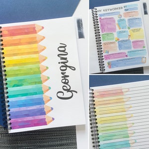 May include: A personalised notebook with a rainbow watercolour design of pencils. The cover features the name "Georgina" in a cursive font. The notebook has a spiral binding and lined pages.