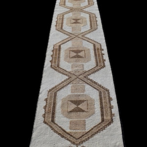 May include: A set of three ceramic mugs with a speckled, matte finish. Each mug features a different color: light blue, cream, and gray. The mugs have a simple, modern design and a comfortable handle.