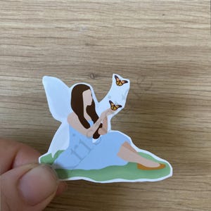 Sticker fée avec des papillons