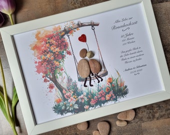 May include: A framed watercolor painting of a couple sitting on a swing in a garden. The painting is decorated with red glitter hearts and the text "Alles Liebe zur Rosenhochzeit" (German for "All the love for the rose wedding"). The text also includes the date "12.04.2038".