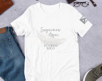 Seguimos Aqui, Country Flag Sleeve, The Americas, Pava Hat, Superbowl Halftime Show, Black or White Unisex Butter Soft Tee T-Shirt