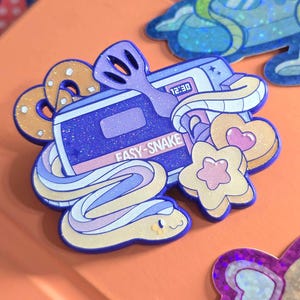 EASY-SNAKE OVEN | silly snakes v2 glitter enamel pin
