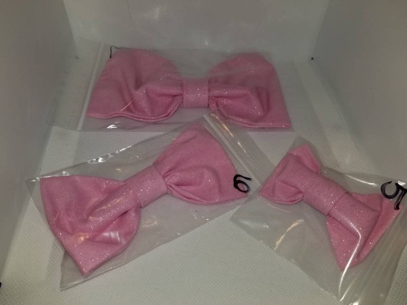 Bright and glittery dogcat bows and bowties for collar