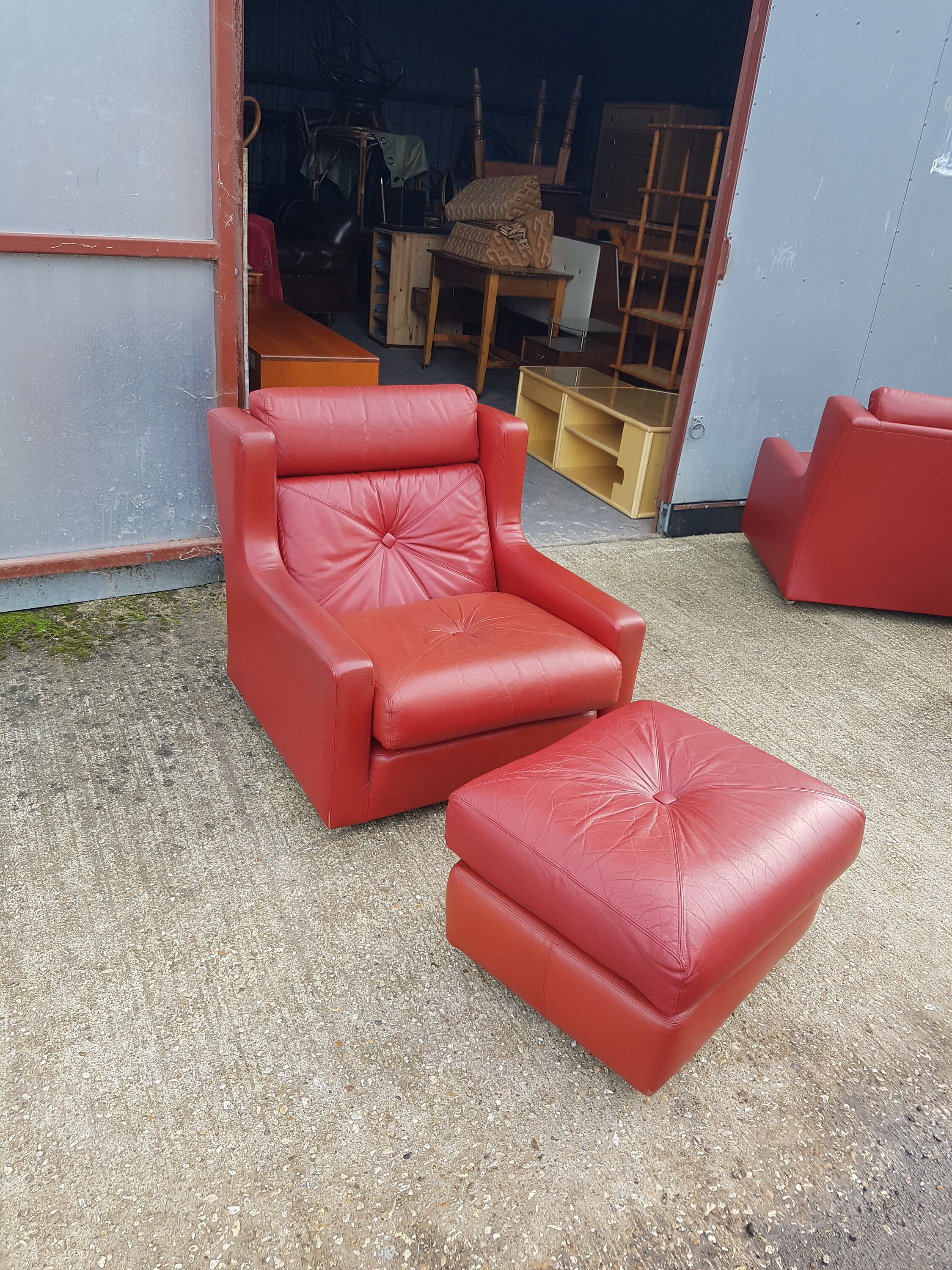 Red leather armchair with footstool on castors retro Etsy