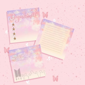 May include: A set of three printable stationery note cards featuring a pastel pink and blue watercolor background with clouds and stars. The top card has the word "Dynamite" written in black cursive. The middle card has lyrics from the song "Dynamite" by BTS. The bottom card has a silhouette of the BTS members and the BTS logo.