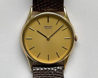 Reloj Seiko de cuarzo de 34 mm para hombre, de los años 80