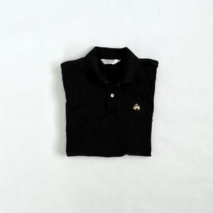 Brooks Brothers, svart pikétröja i bomull från 1990-talet, storlek Medium