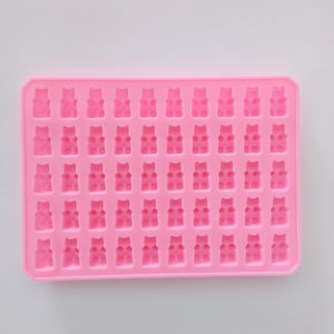 May include: Pink silicone mould with 48 individual cavities shaped like gummy bears.