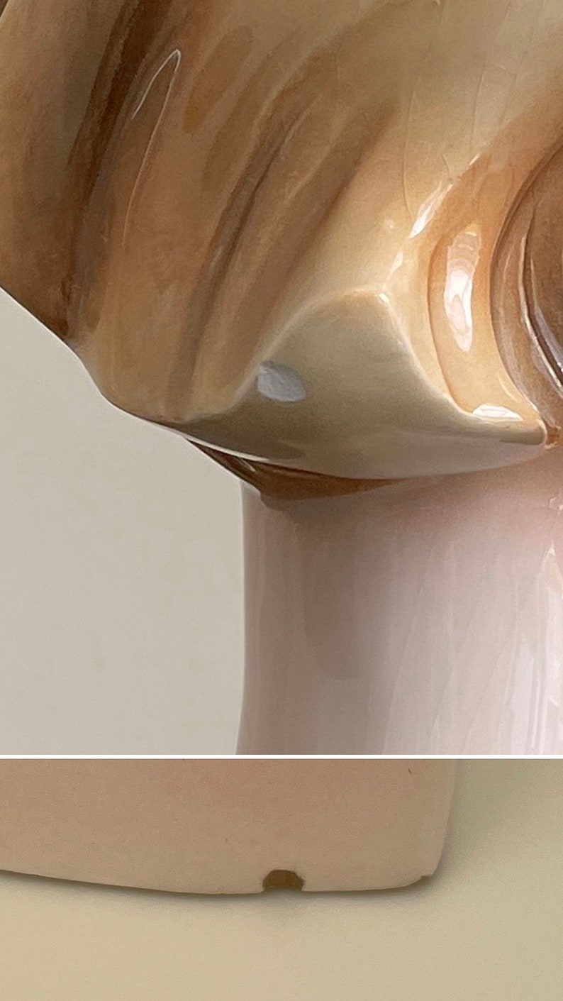 May include: A porcelain figurine of a woman with a brown and white dress. The figurine is in a standing position and has a slight smile on her face. The figurine has a small chip on the bottom.