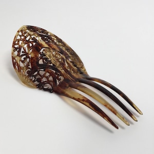 Celluloid antique hair comb