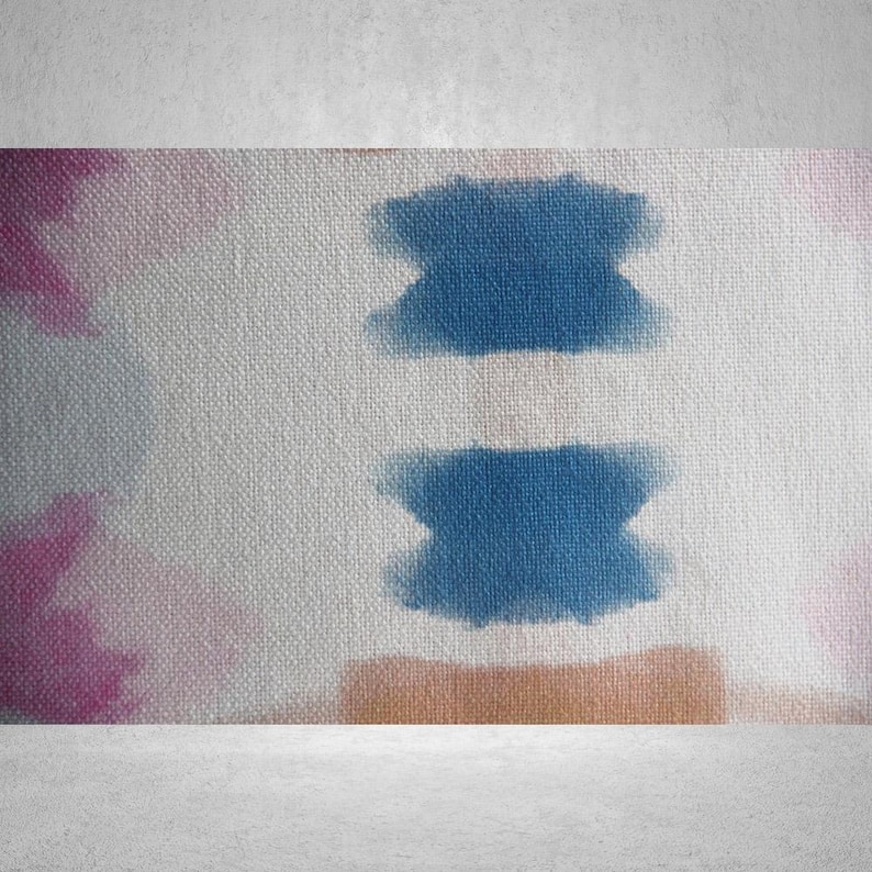 May include: A white canvas background with a blue watercolor design. The design is in the shape of two horizontal rectangles. The canvas has a subtle texture.