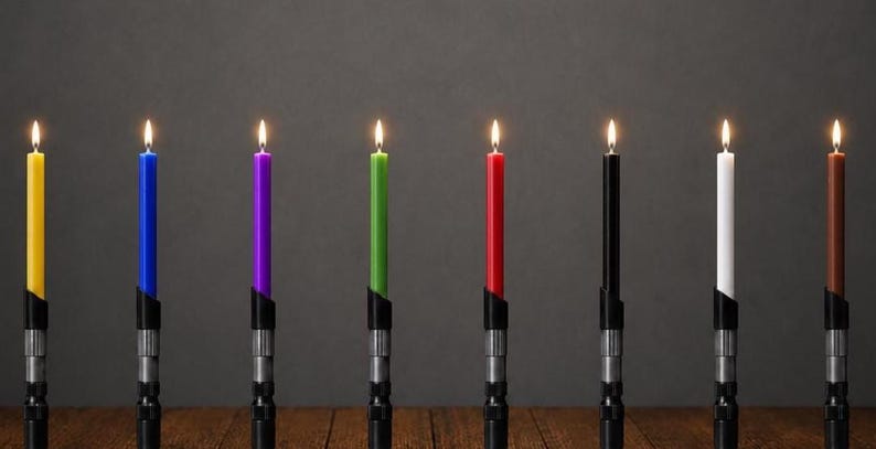 May include: Eight tall, slender taper candles in yellow, blue, purple, green, red, black, white, and brown, each lit with a small flame. The base of each candle is held within a metallic, cylindrical holder featuring a detailed, ridged design.