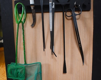 Suporte para ferramentas montado em aquário