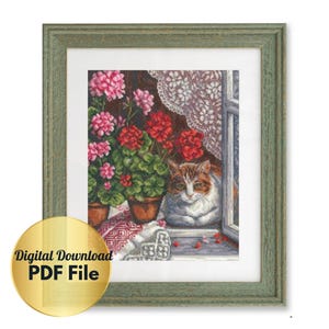 May include: Cross stitch pattern featuring a cat sitting by a window with a potted plant of red and pink flowers. The pattern is framed in a green frame and includes the text "Digital Download PDF File".