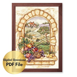 May include: Cross stitch pattern of a window with a view of a Tuscan landscape. The window is framed in stone and has a basket of fruit on the sill. The fruit includes pears, apples, grapes, and lemons.