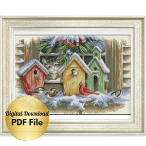 May include: A cross-stitch pattern featuring a winter scene with a cat peeking out of a birdhouse.  The birdhouse is surrounded by other birdhouses and small birds.  The scene is set against a backdrop of a snowy forest.  Digital Download PDF File.