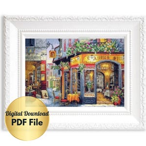 May include: A digital download PDF file of a cross stitch pattern featuring a colorful illustration of a Parisian cafe with the text "Antico Siglio" above the entrance.