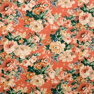 Tela para tapicería de algodón y lino color coral con estampado floral Castletown de Lee Jofa England
